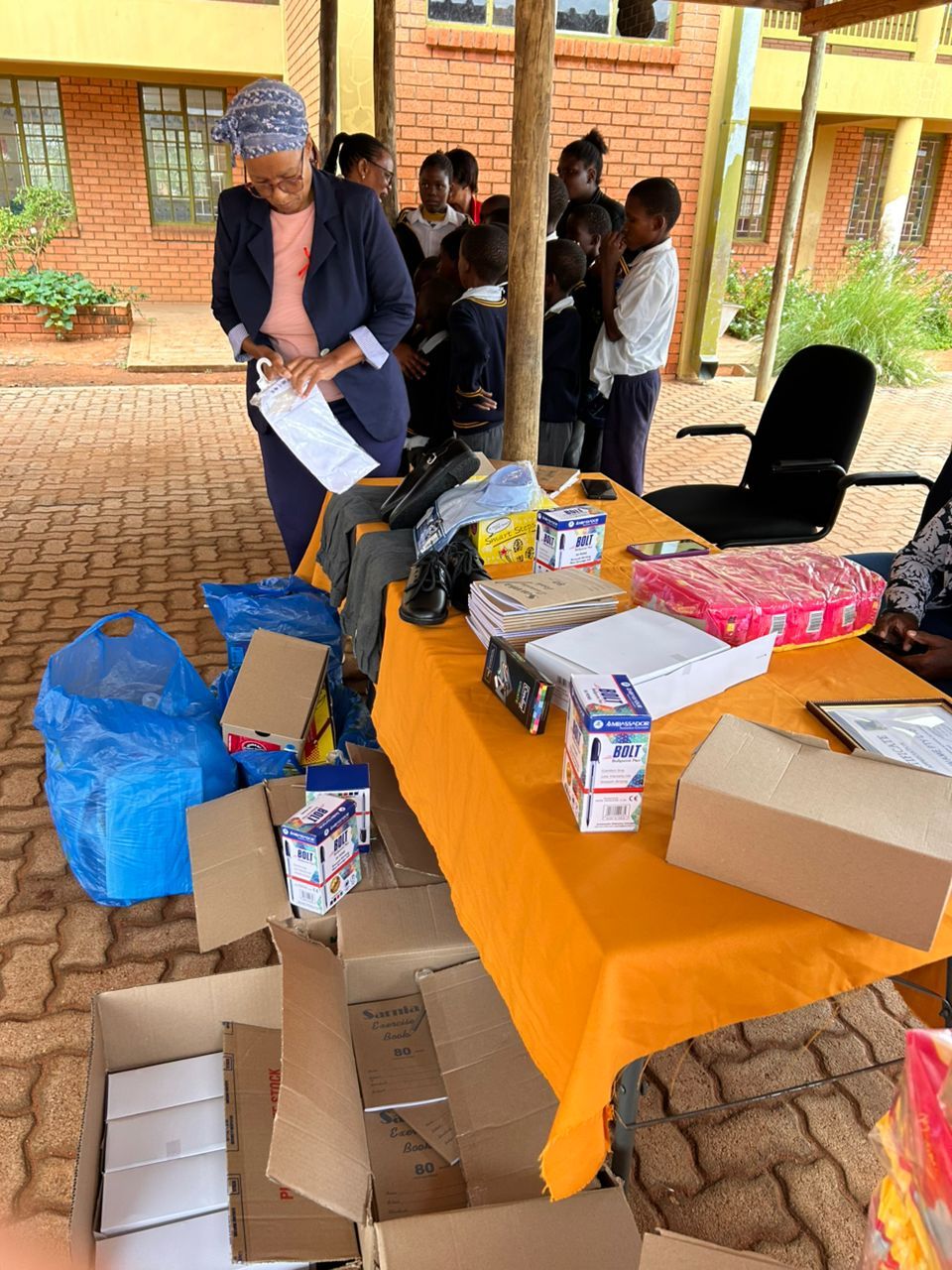 Learners and school management gather